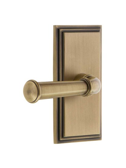 Grandeur Carre Rosette Door Set with Georgetown Levers Right Handed in Antique Brass.